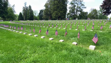 gettysburg national cemetery, american civil war army soldiers buried at battleground, american flags, memorial day theme