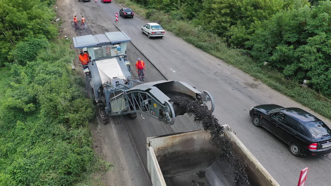 Road under construction. Heavy duty machinery during highway construction