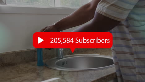 cleaning kitchen sink, person with subscriber count animation overlay in kitchen