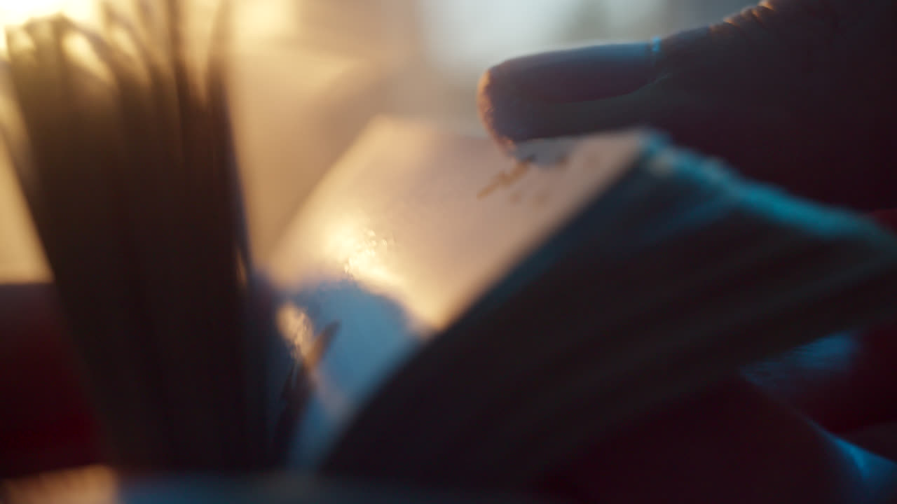 Hands Handling Money and Cards