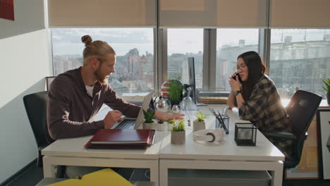 Emotional-man-talking-colleague-room-closeup.-Positive-woman-answering-teammate