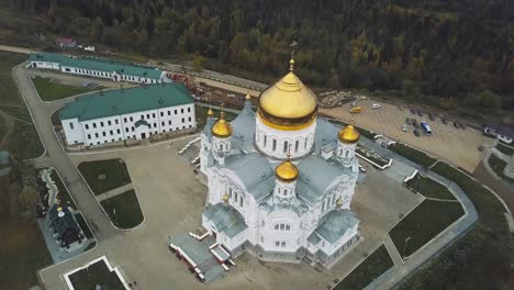 aerial view of a russian orthodox church and monastery complex