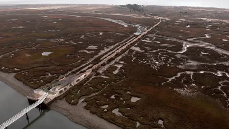 aerial wide shot over wetlands in portugal, nature reserve park algarve