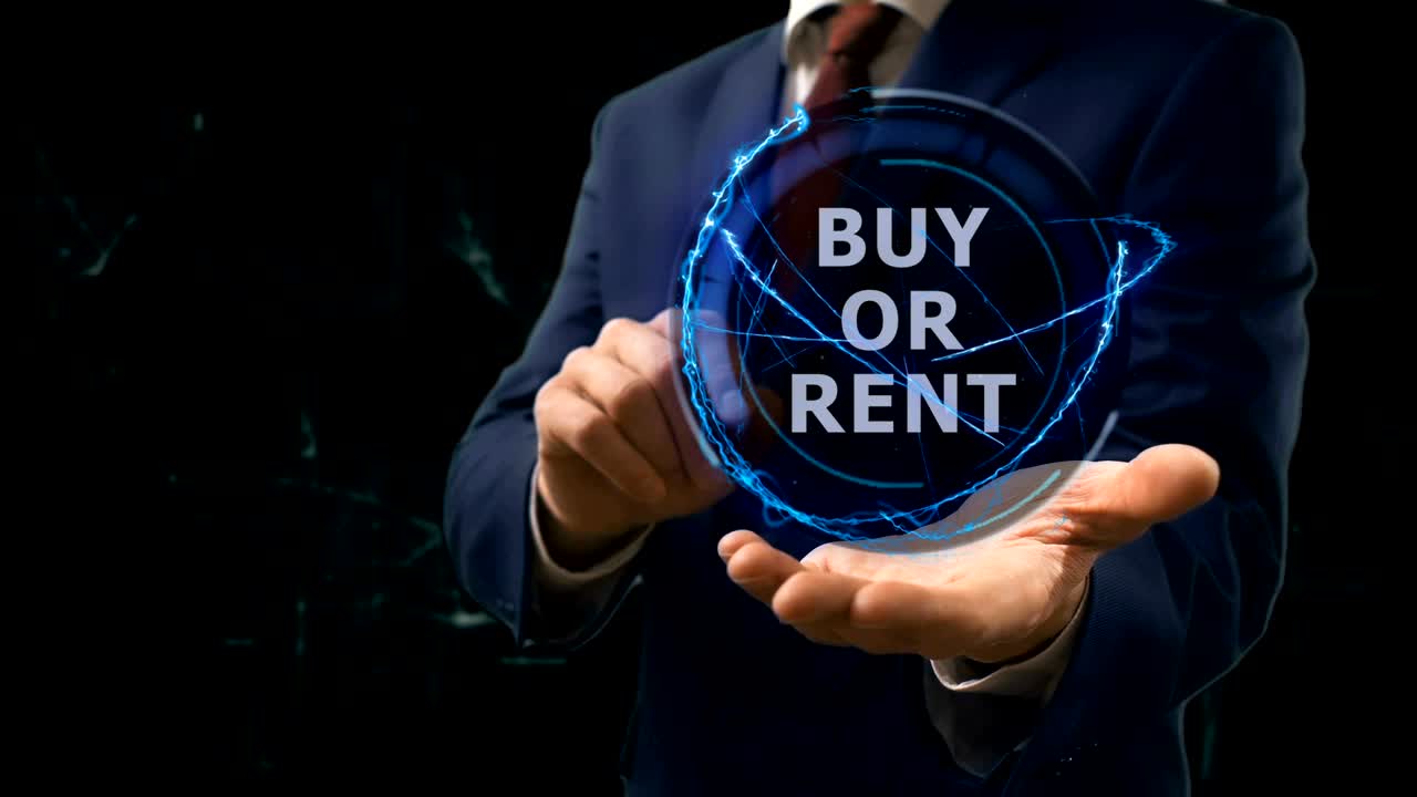 hombre de negocios muestra concepto holograma comprar o alquilar en su mano