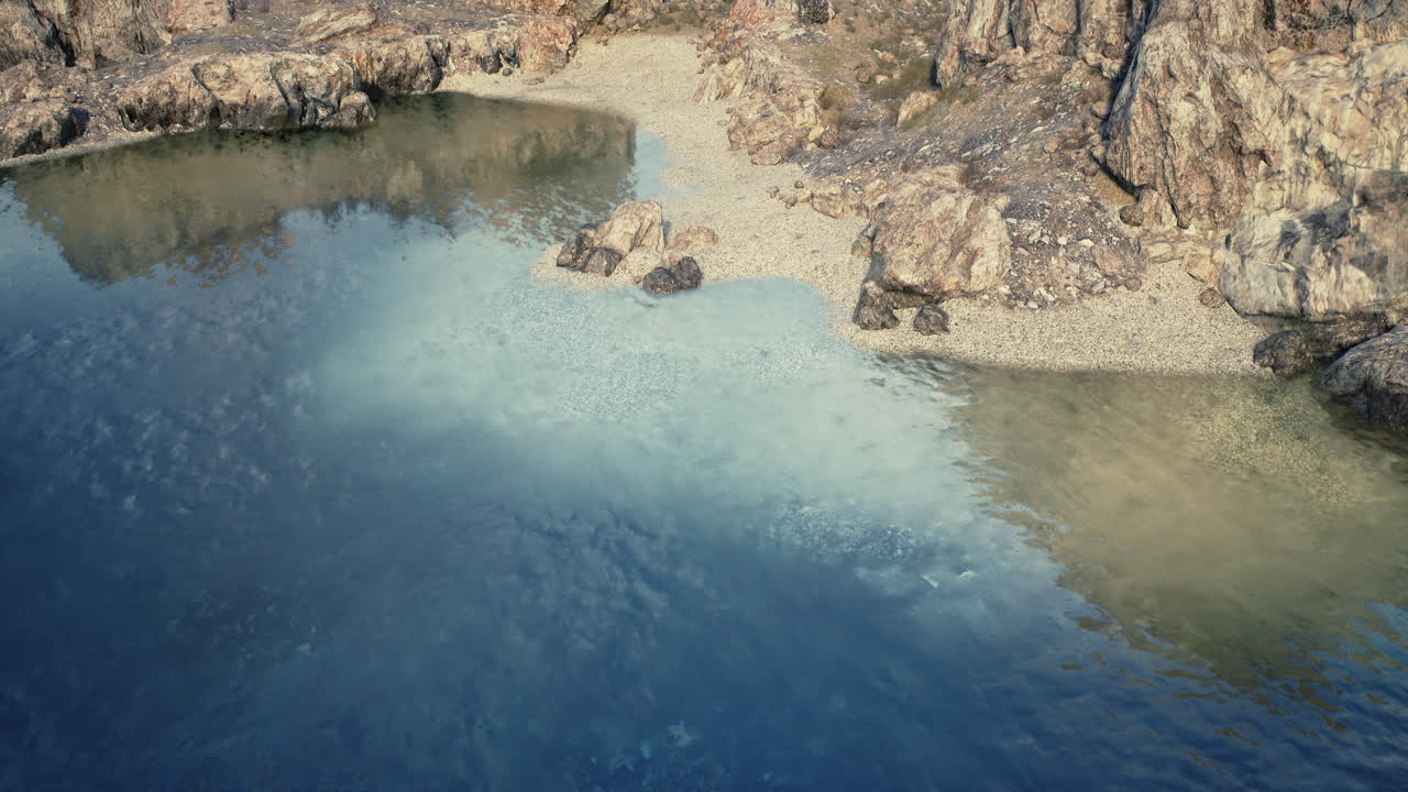 Aerial view of rocky cliffs overlooking a body of water
