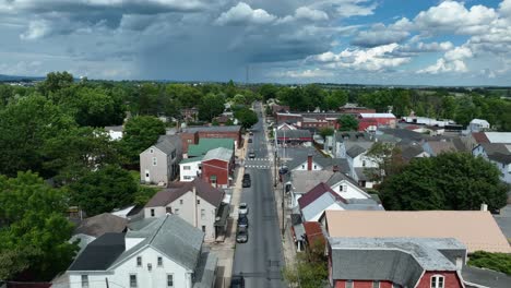 Aerial-establishing-shot-of-town-in-summer