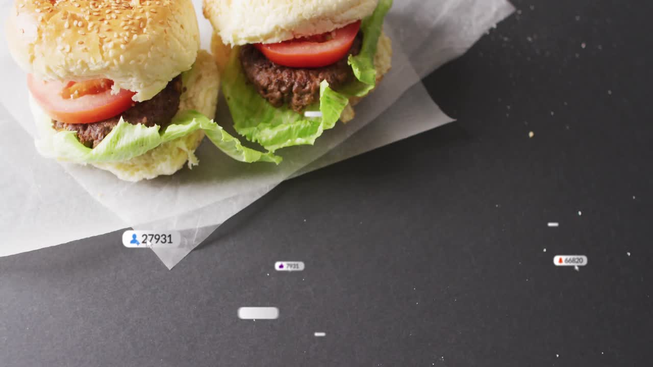 After pause, digital badges drifting around burger sliders, growing then fading, showing engagement