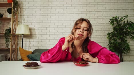 woman enjoying chocolate and cookies