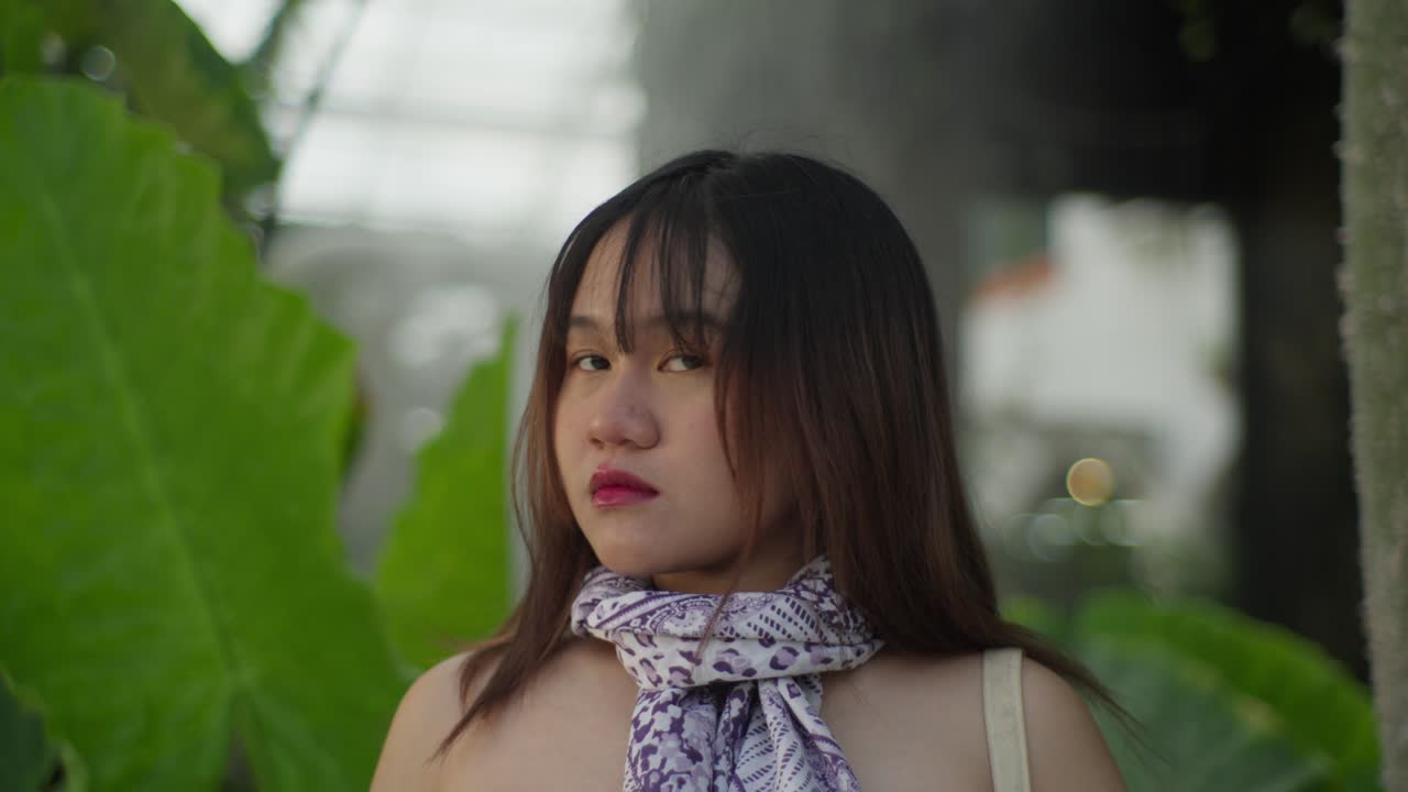 Indonesian attractive young brunette female, outdoor scenery, close-up