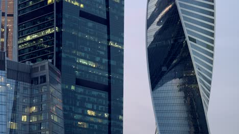 modern skyscrapers in a city at dusk