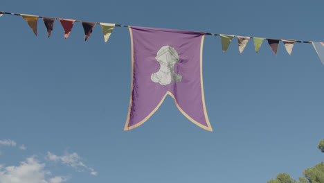 close-up detail of a colored flag hung as