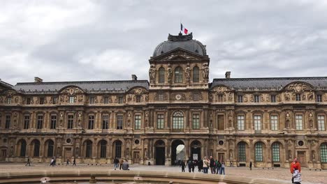 visitors explore a grand, ornate european palace