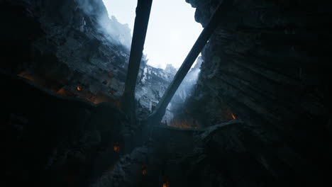 dramatic view of a dark cavern illuminated by shafts of light