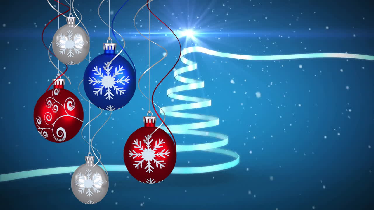 Animation of snow falling over christmas baubles and tree
