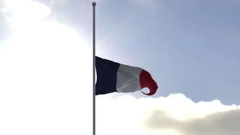 bandera francesa a media asta en el viento