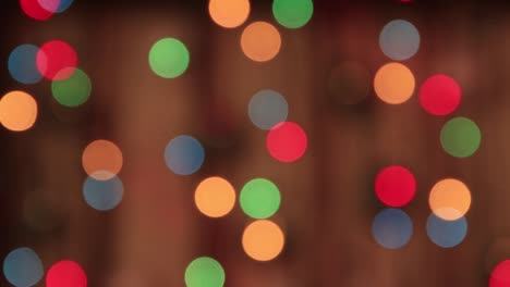 Festive rare multicolored lights in the dark with a slow red beam.