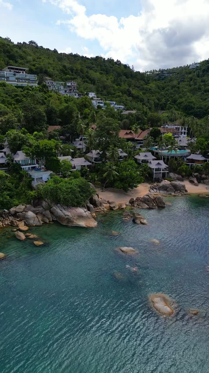 Koh Samui luxury Gulf of Thailand resort private beach, aerial drone vertical video