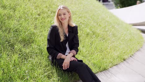 business woman sitting outdoors