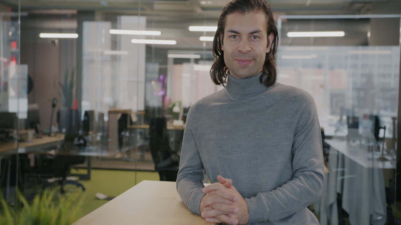 Man Smiling in Modern Office