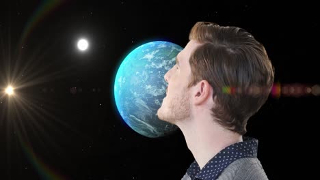 animation of moon and space over caucasian man