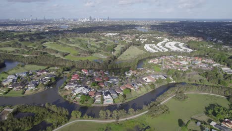 suburban community with lush green landscape in the town of robina in gold coast, qld, australia