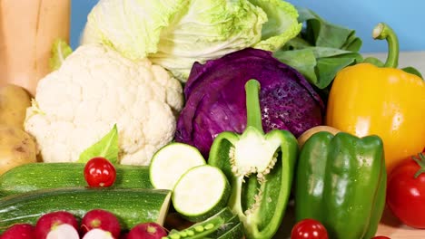 assorted vegetables arranged on a white background