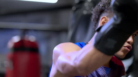 man boxing training session in gym