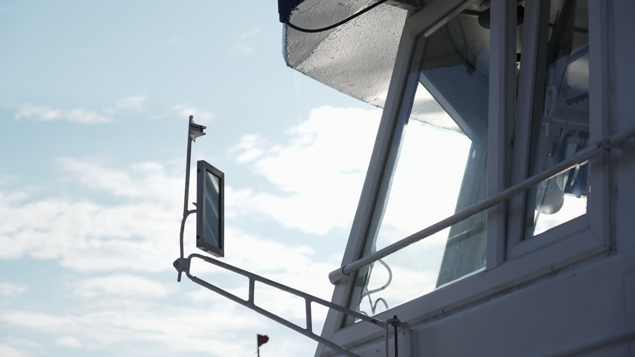 Boat window with sky and clouds