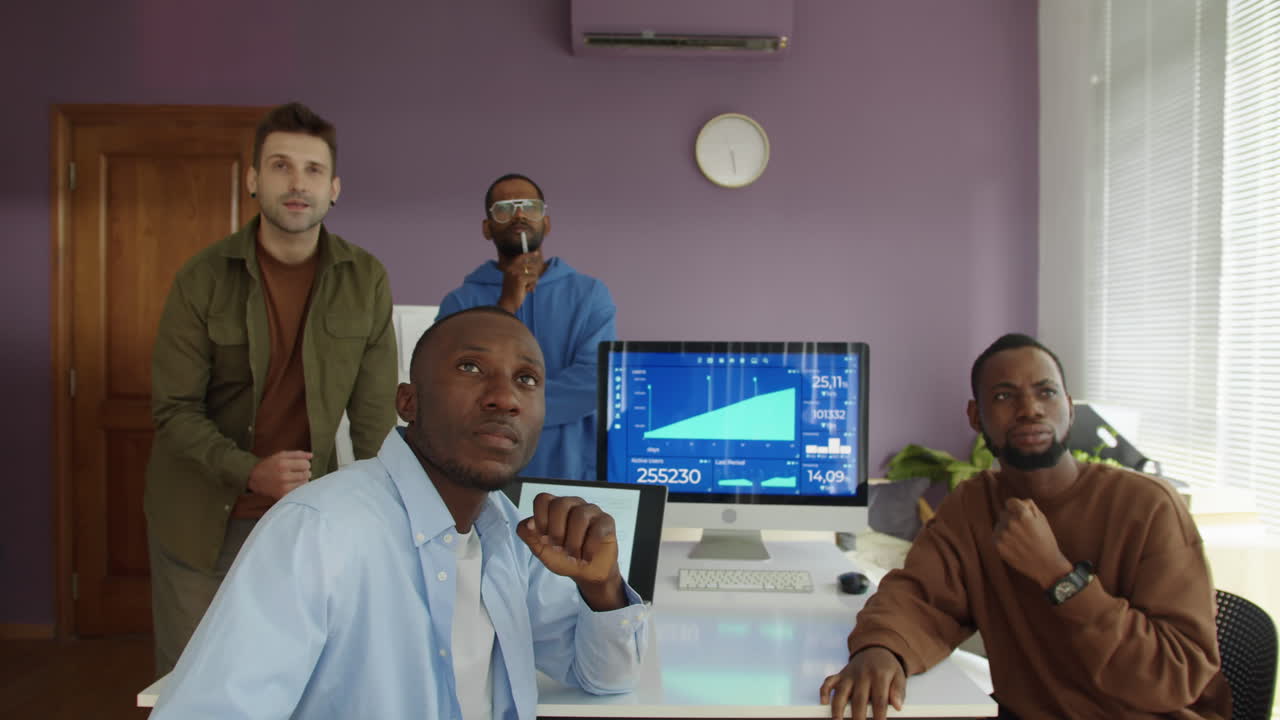 Traders Monitoring Stock Market Online at Office