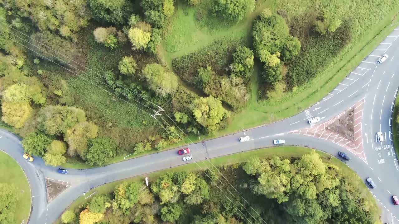 High angle aerial view above suburb traffic roads junction landscape