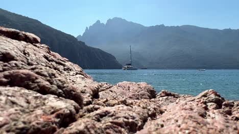 luxury yacht and catamaran moored at bussaglia beach in corsica island, france