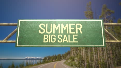 Summer-Big-Sale-on-road-sign-with-road-and-forest-in-daytime