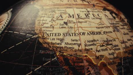 close-up of a vintage globe showing the united states