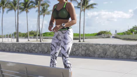 athletic woman jumping in park