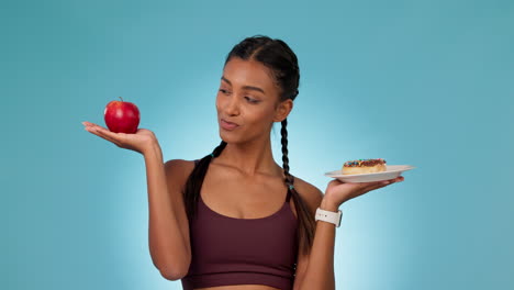 Woman,-athlete-and-choice-of-diet-in-hands