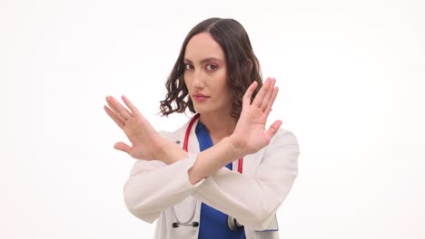female doctor gesturing 'stop' and pointing