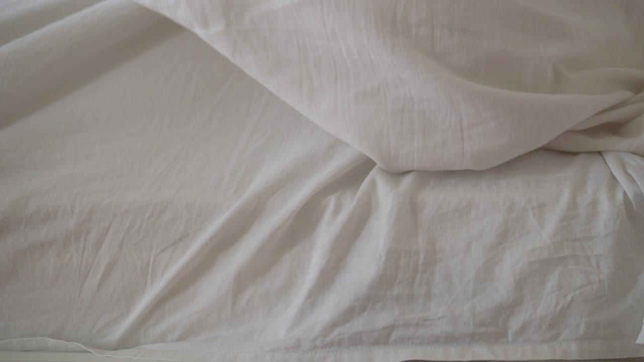 Close-up of White Bed Sheets