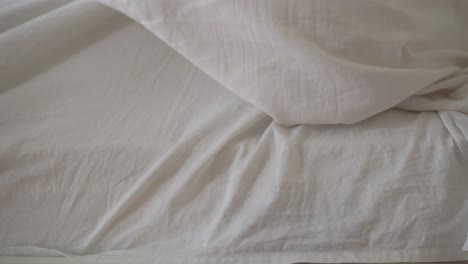 close-up of white bed sheets