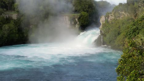 huka falls are a set of waterfalls on the waikato river that drains lake taupo in new zealand. the waikato river exits near port waikato on the west coast of the waikato district.