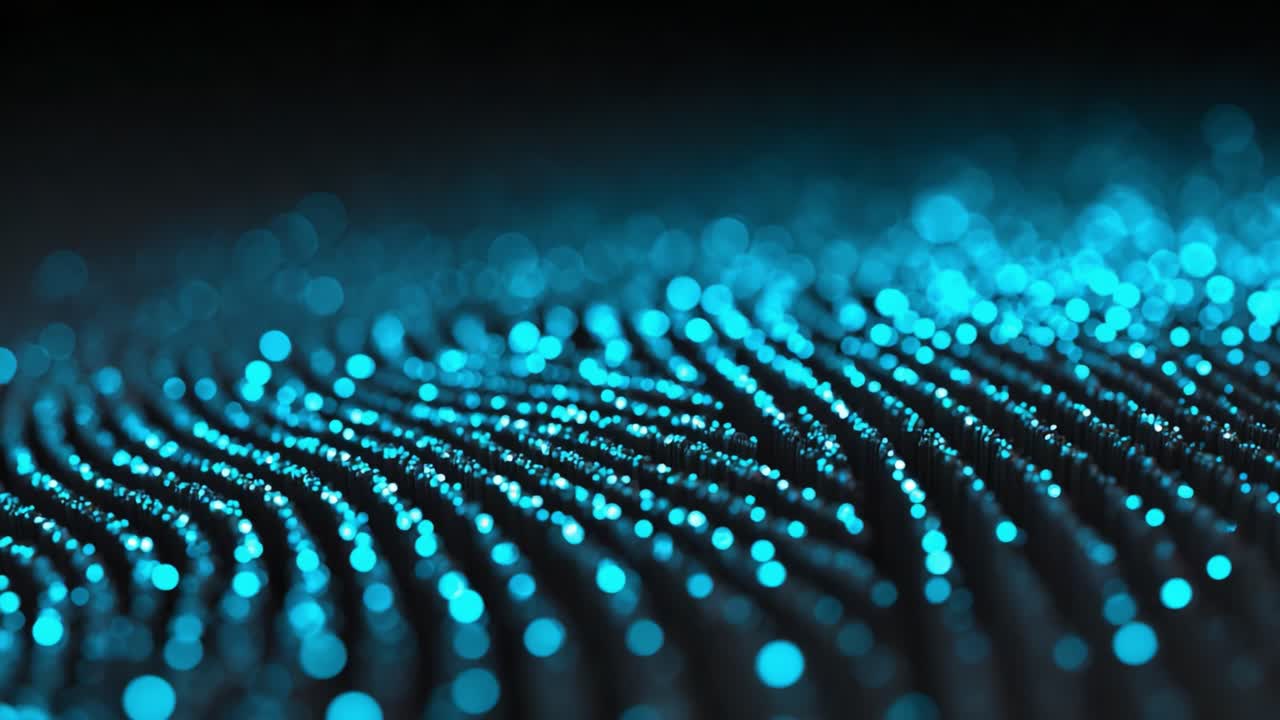 Mesmerizing Patterns of Light and Color: A Close-up Examination of Vibrant Blue Particles Forming Wave-like Structures in an Abstract Visual Display