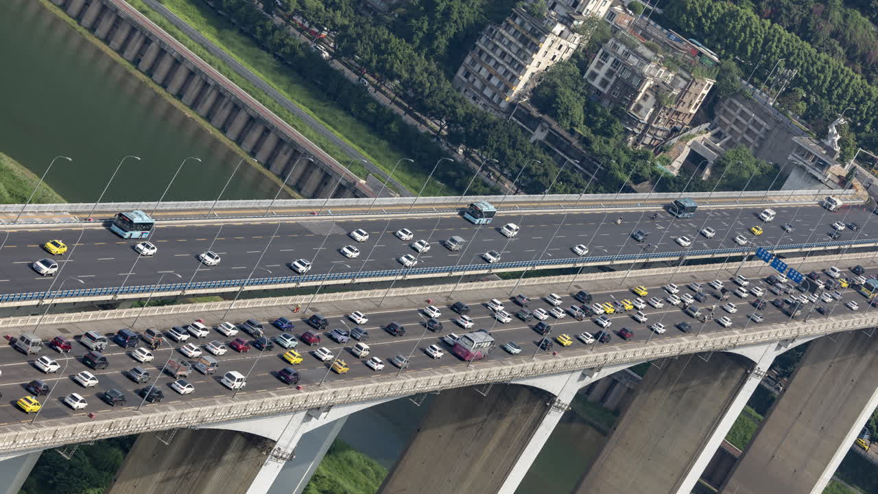 Timelapse of the amazing Chongqing cyberpunk city skyline from a high vantage point wirh the yangtze river