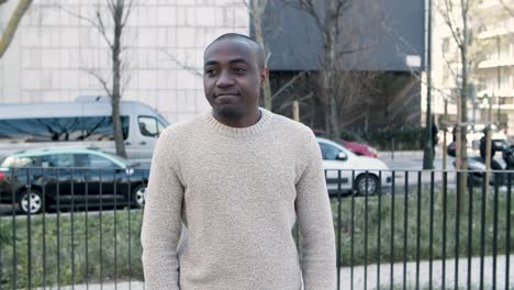 smiling african american man looking at camera