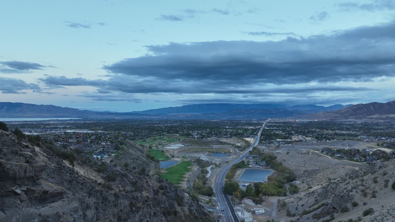 Aerial Pullback Shot Of The Utah Valley Revealing The American Fork Canyon Just Before Dawn