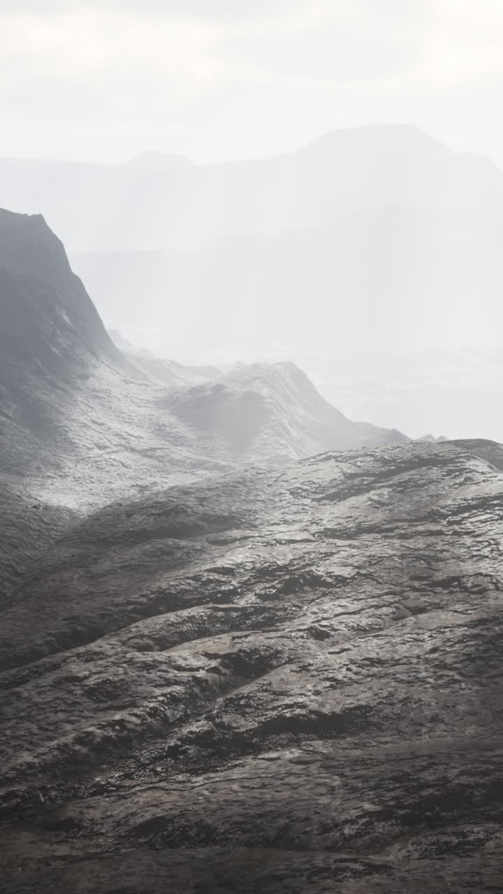 Aerial view of mountains with fog