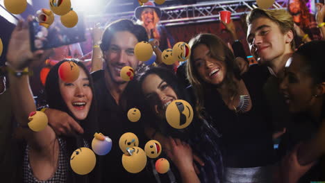 group of friends taking selfie with floating emoji animation over them