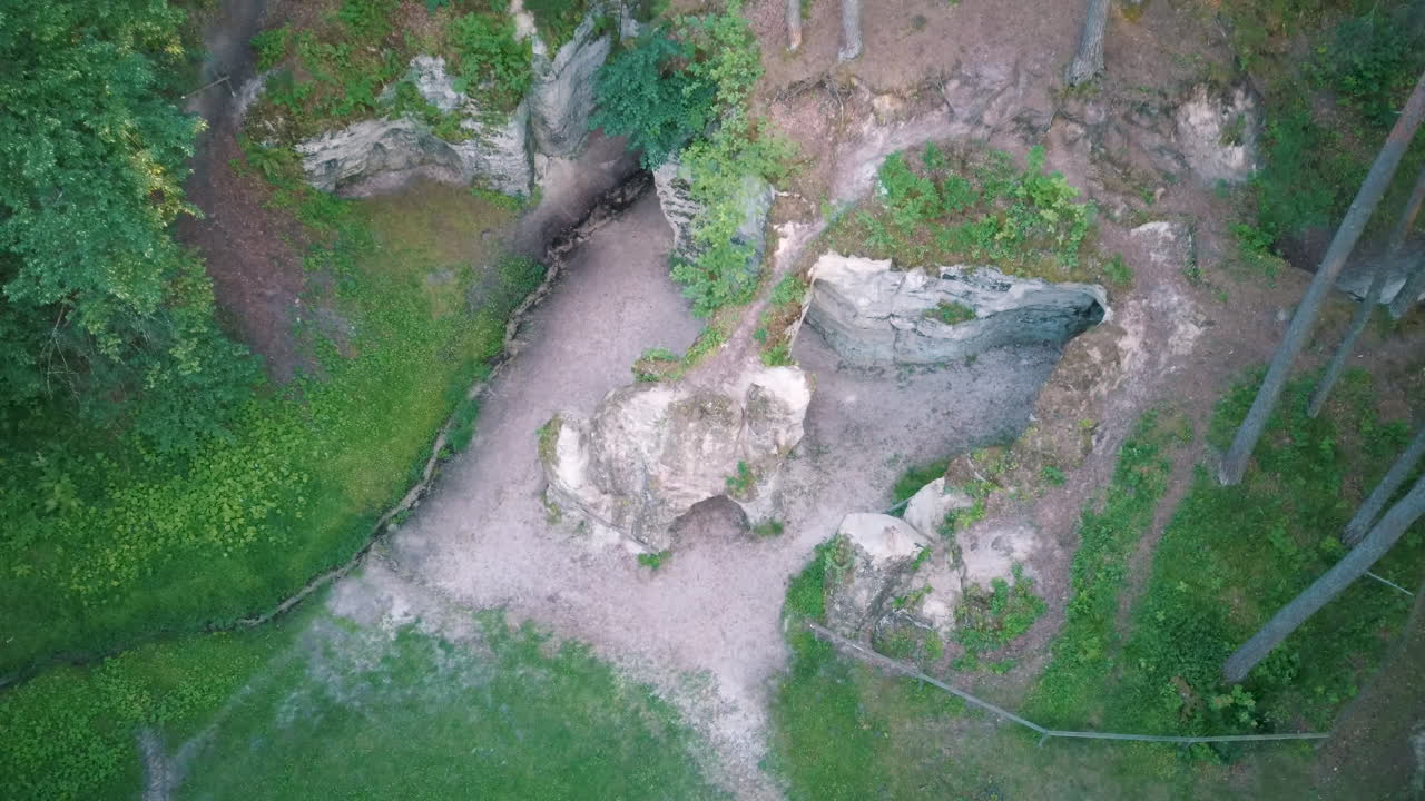 Devil's Oven or Large Ellite Natural Geological Monument  Located in the Gauja National Park at Lode Behind Cesis in Latvia. Licu – Langu Sandstone Cliffs Liepa Cave. Aerial Dron Shoot.