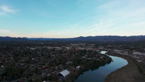 Drone-aerial-view-of-downtown-Napa,-California-at-sunset-in-the-spring