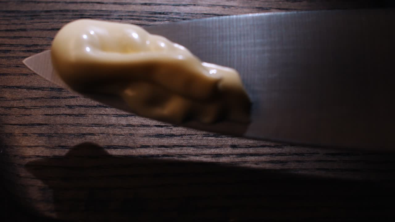 Wood grain surface with cream smear