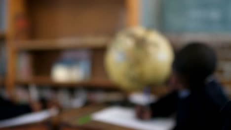 schoolgirl looking at camera in the classroom 4k