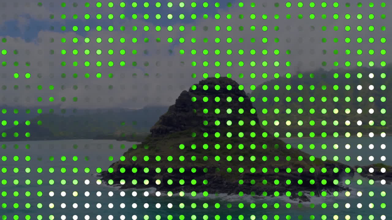 Animation of green spots over rock on sea